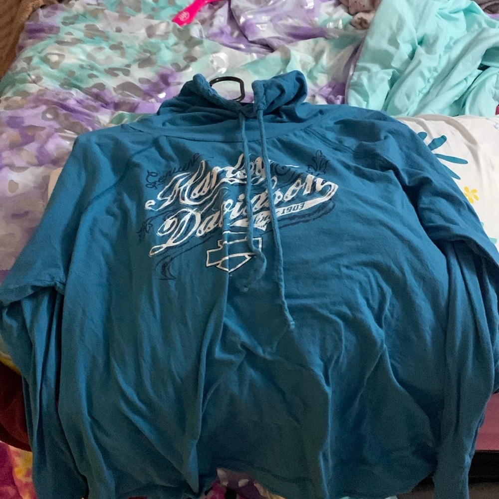 A Harley Davidson, blue, long sleeve thin shirt